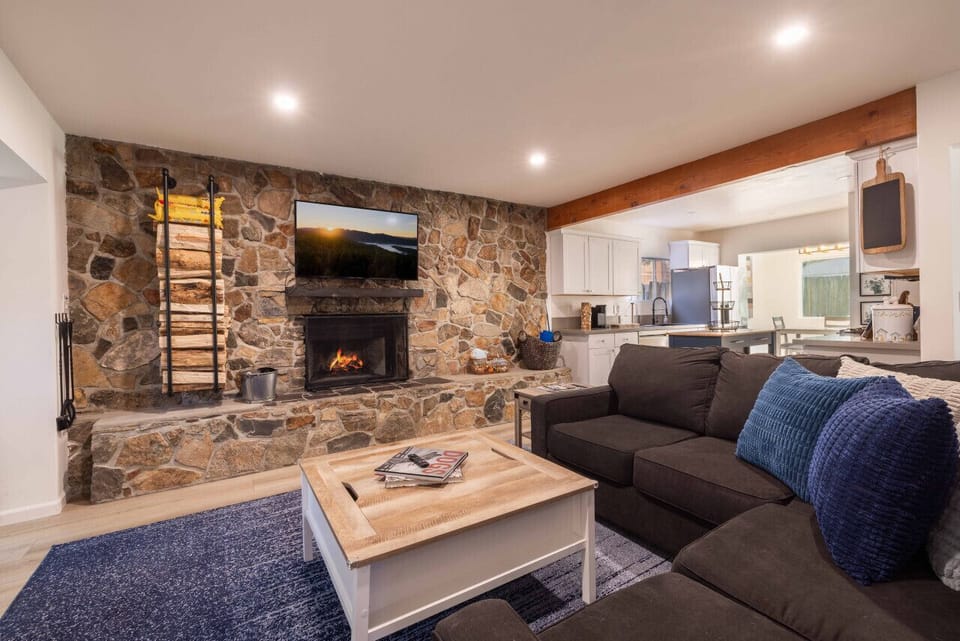 WOW! Look at this brick fireplace with entertainment