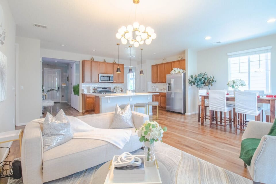 Rest, reconnect, and recharge in this designer living space where board games await family fun and plush seating invites conversation