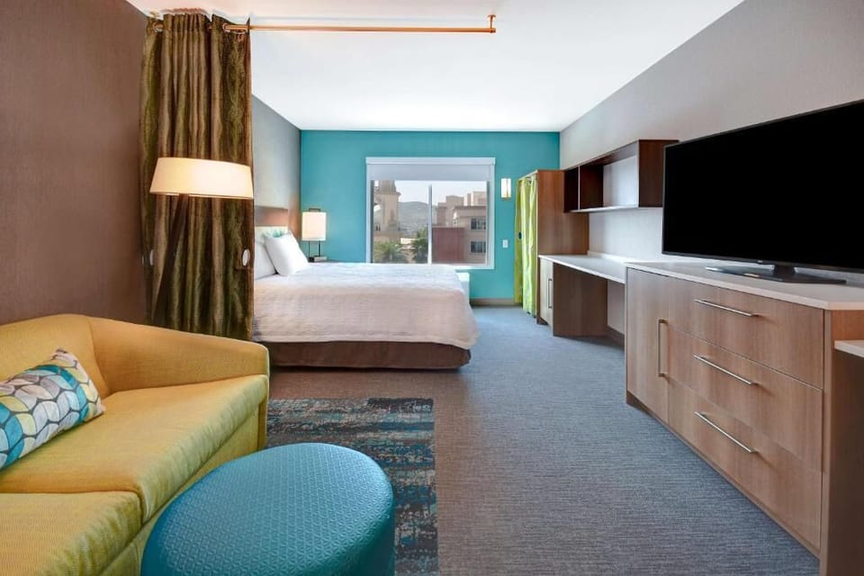 Lounge and recharge in an airy studio-style room layout.