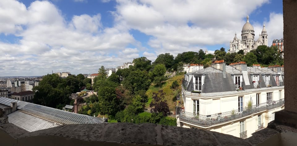 Panorama view from studio apartment: Montmartre & the whole city of Paris.