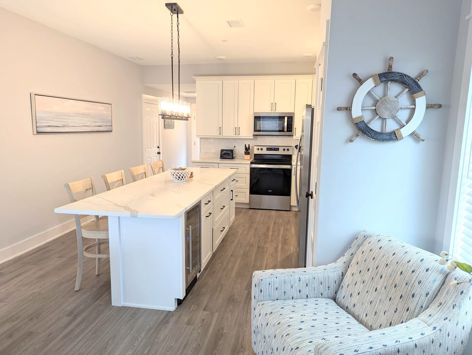 Large pantry and plenty of cupboards and storage.