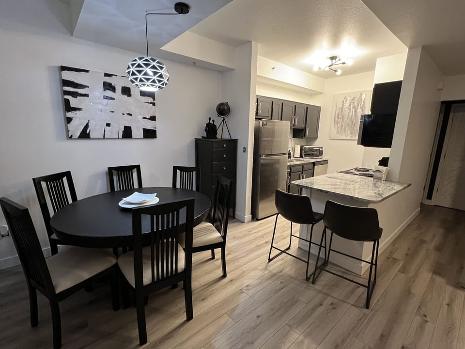 Dining table off the kitchen, granite counter tops, fully furnished kitchen.