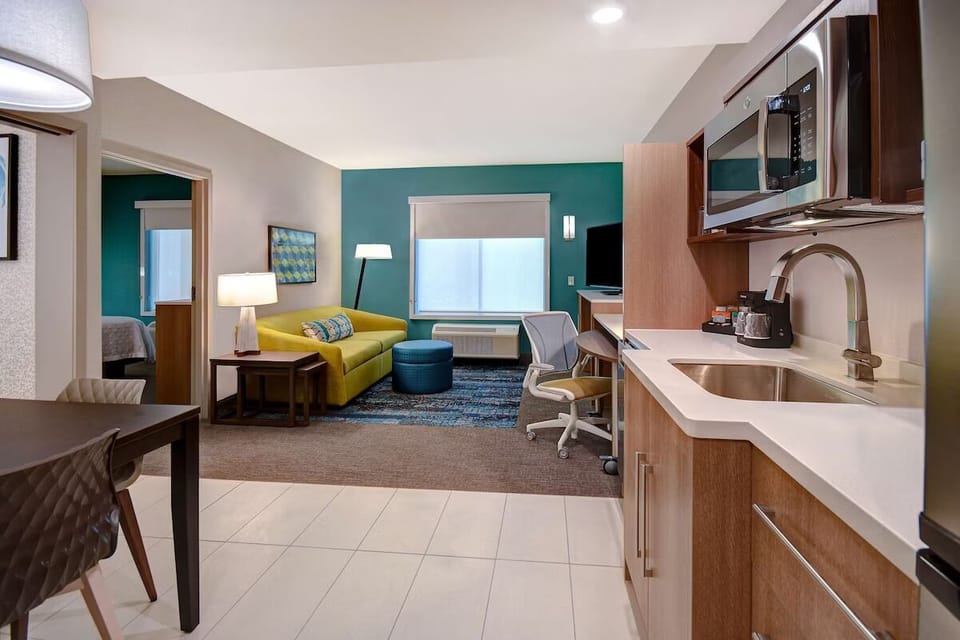 Settle in with a handy kitchenette for easy snacks anytime.