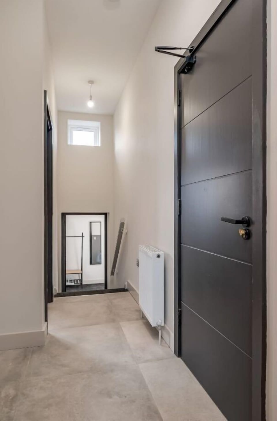 Hallway, stairs down to bedroom 2 