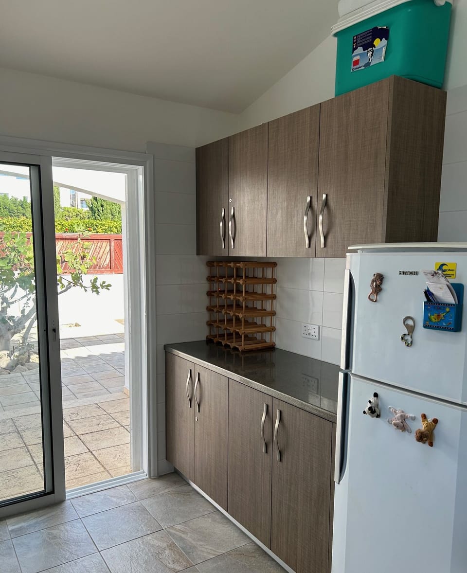 front view of the kitchen to patio doors