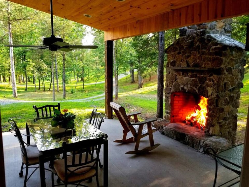 Outdoor fireplace at the barn is an amazing space to gather in the evenings.     Shared space