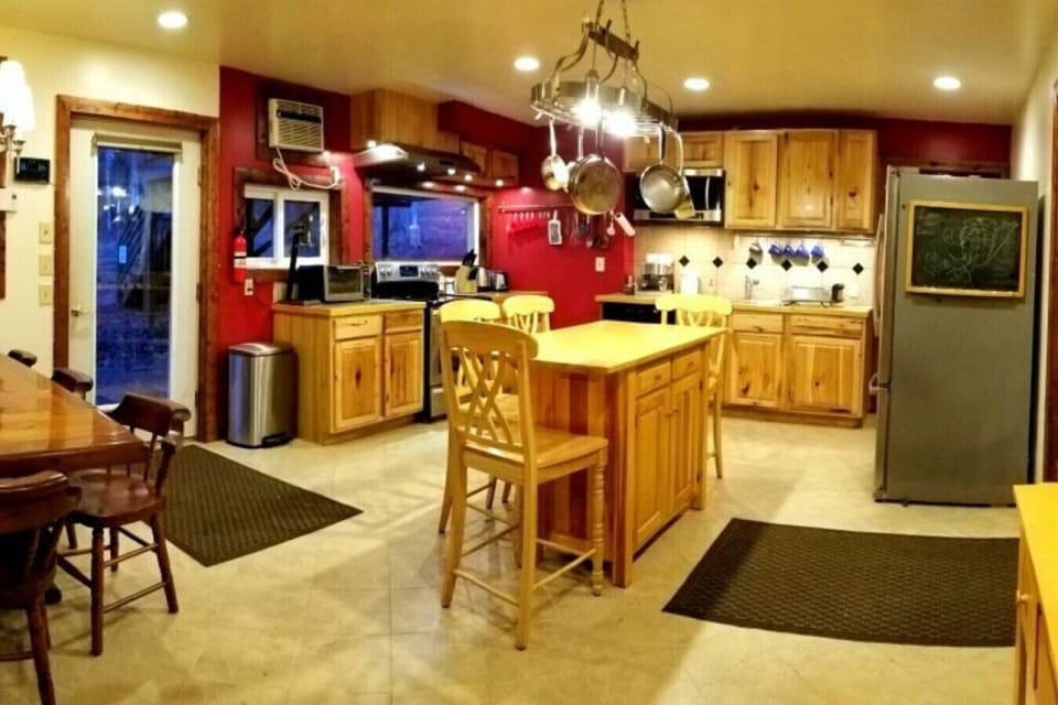 Well stocked communal kitchen on the lower level of the Barn.     Shared space