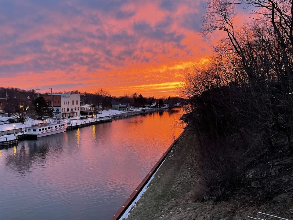 This is a sunset captured from the balcony of this condo