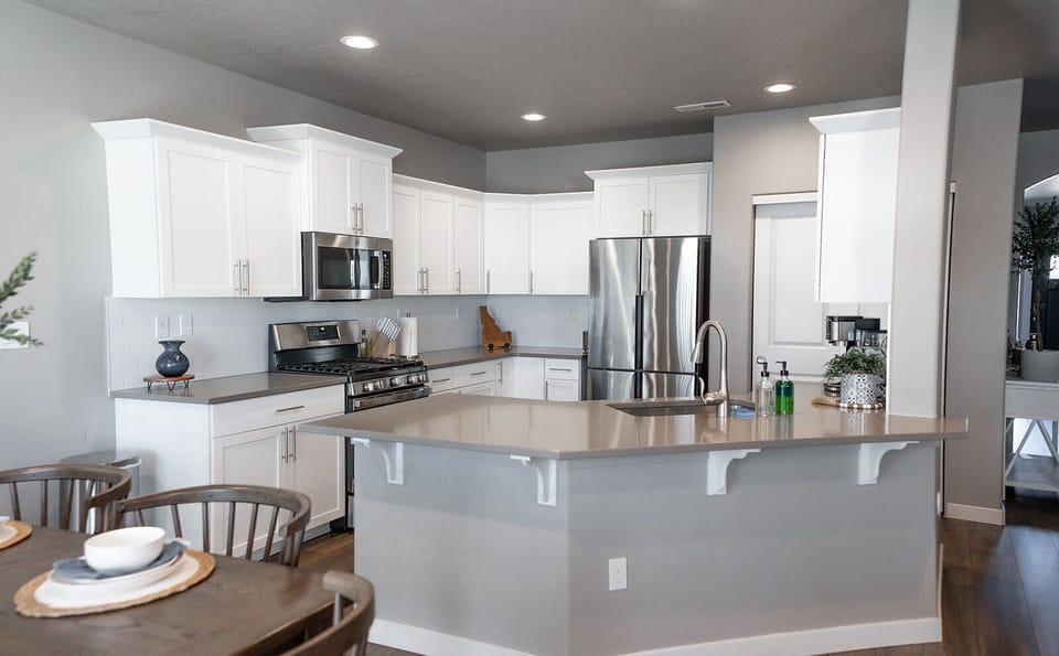 Kitchen w/quartz counters & open to the living/dining room so your all together!