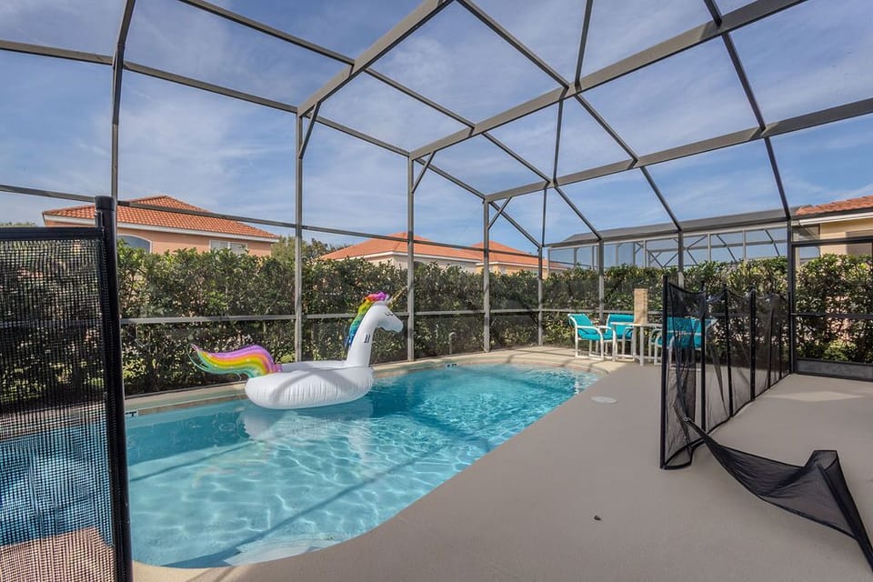 Swimming pool with sun deck and inflatable