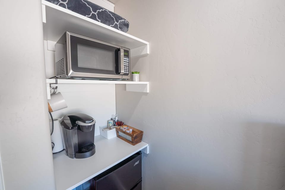 Microwave, coffee maker and mini fridge all for your use!