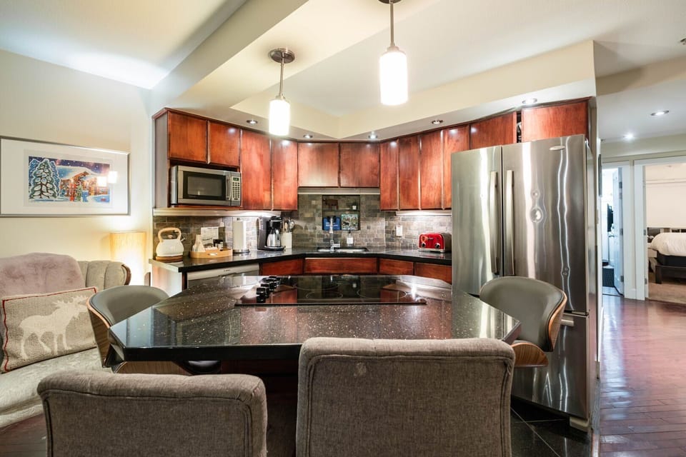 Full kitchen and dining area