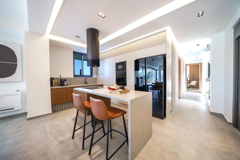 Fully equipped kitchen on the ground floor.