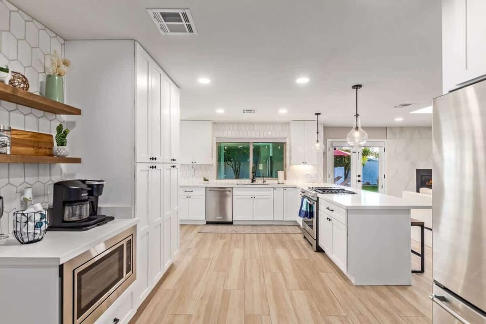 Stainless Steel Appliances, Pool View and Separate Coffee Bar