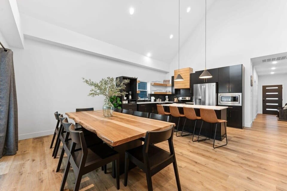 Dine together inside at this spacious table.