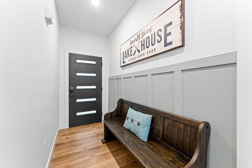 Step into the front hallway of this lake house!