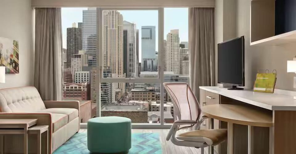 Soak up skyline views from your bright, modern suite.