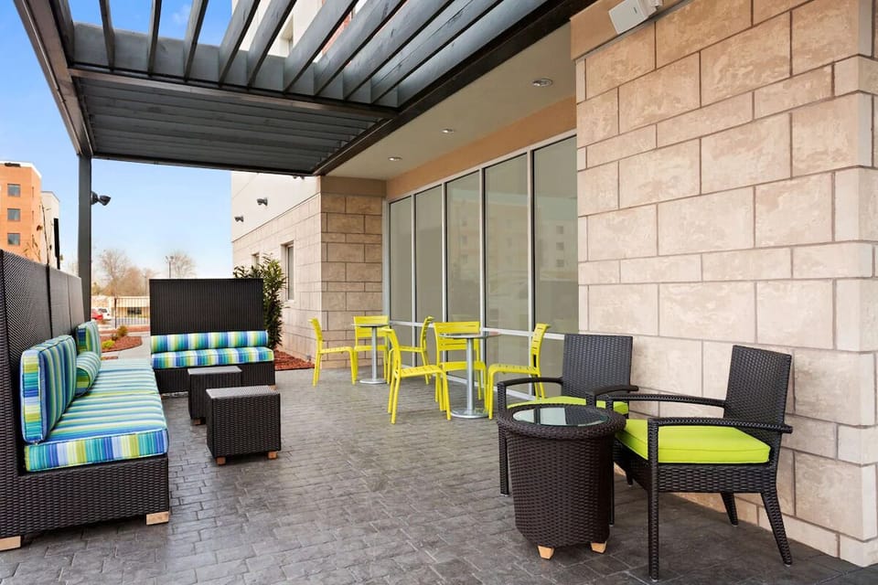 Stretch out on cushioned seating for breezy afternoon lounging.