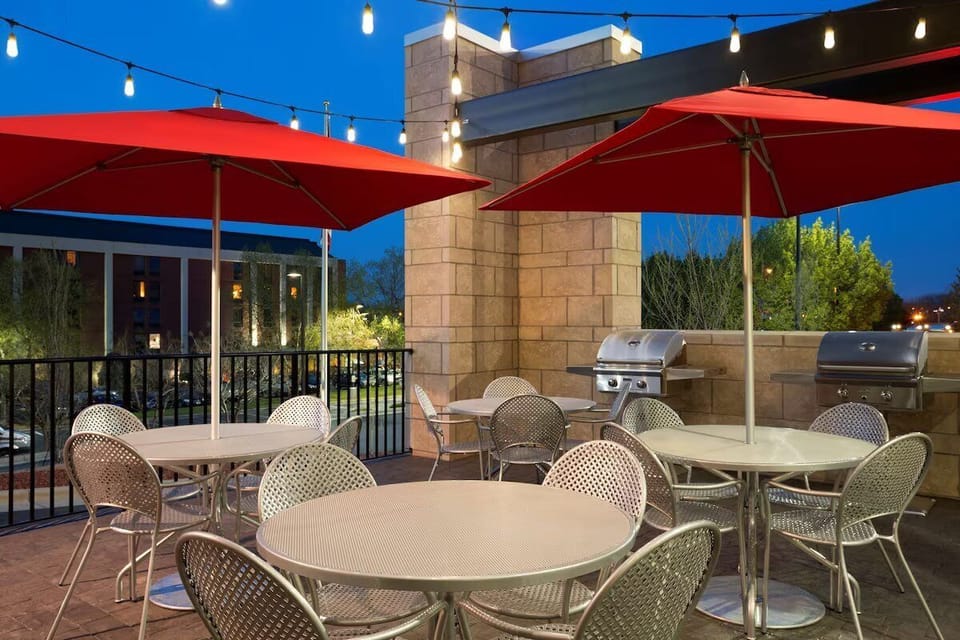 Unwind under glowing string lights on the rooftop terrace.