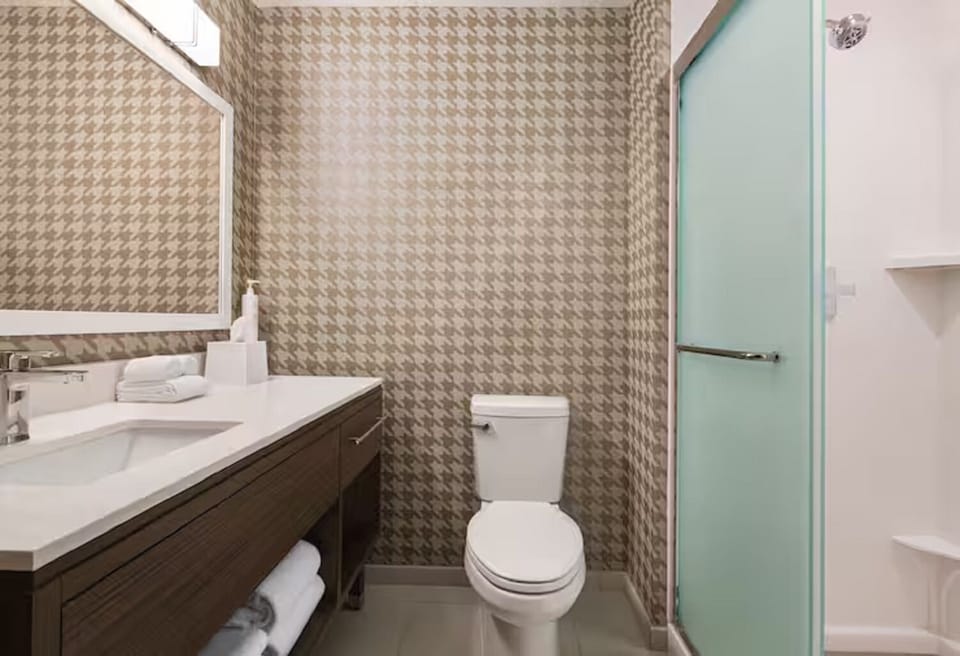 Enjoy a quick rinse in the spacious walk-in shower.