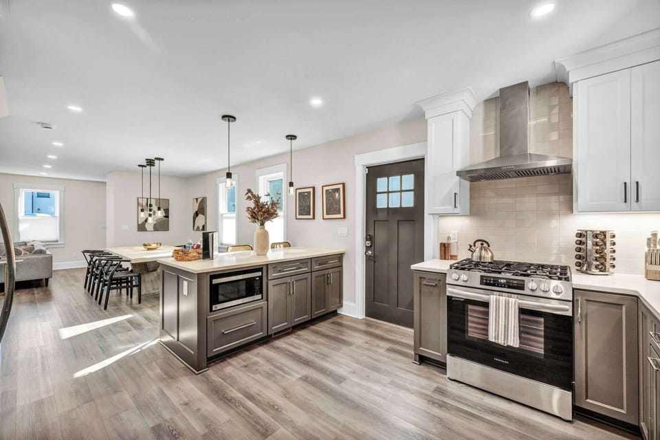 Bright & Beautiful Cooking Space. Enjoy natural light, modern finishes, and ample counter space in this charming kitchen, perfect for cooking up memories.