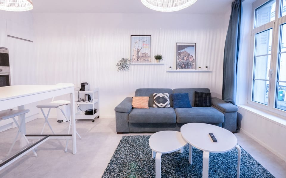 "Open Living Space: Living Room, Dining Room, and Kitchen in Harmony"