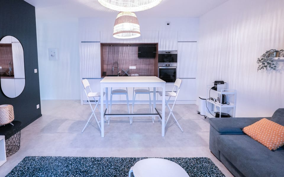"Open and Bright Kitchen with Dining Area"