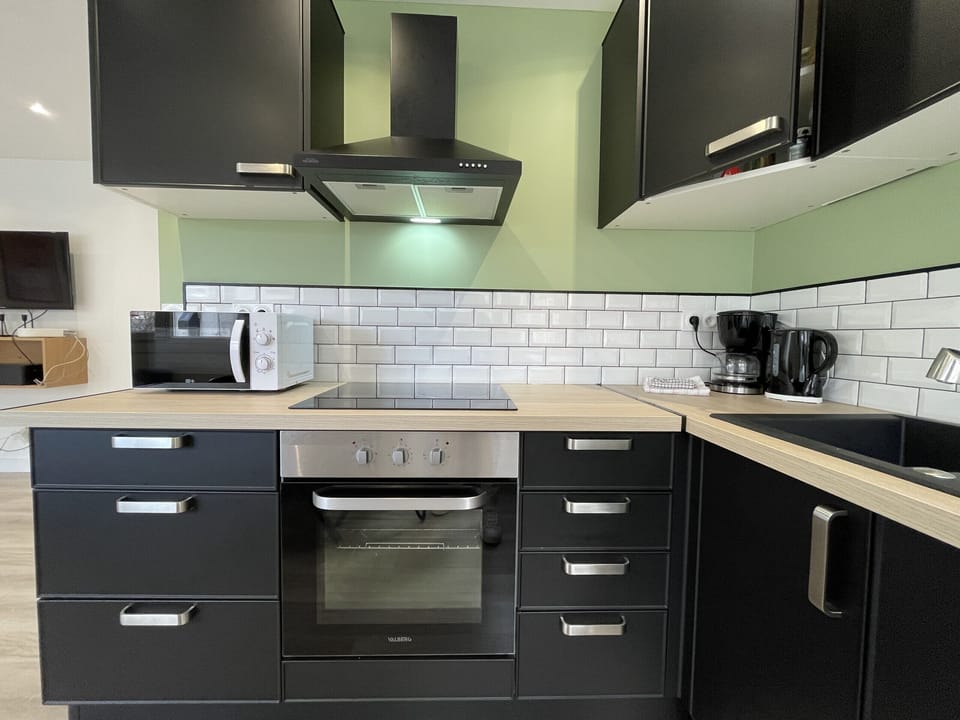 "Fully equipped kitchen with appliances - Le Scuderia"
