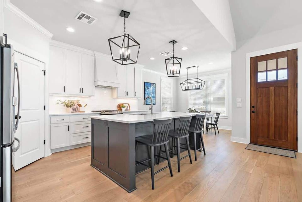 The island bar allows kids and guests to visit while breakfast is being prepared. Doubles as a workspace for business, homework, or evening conversation. If you'd like a private chef, watch and enjoy a fun evening here at the bar.