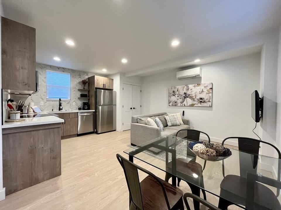 Unwind in the spacious ambiance of our open living, dining, and kitchen area.