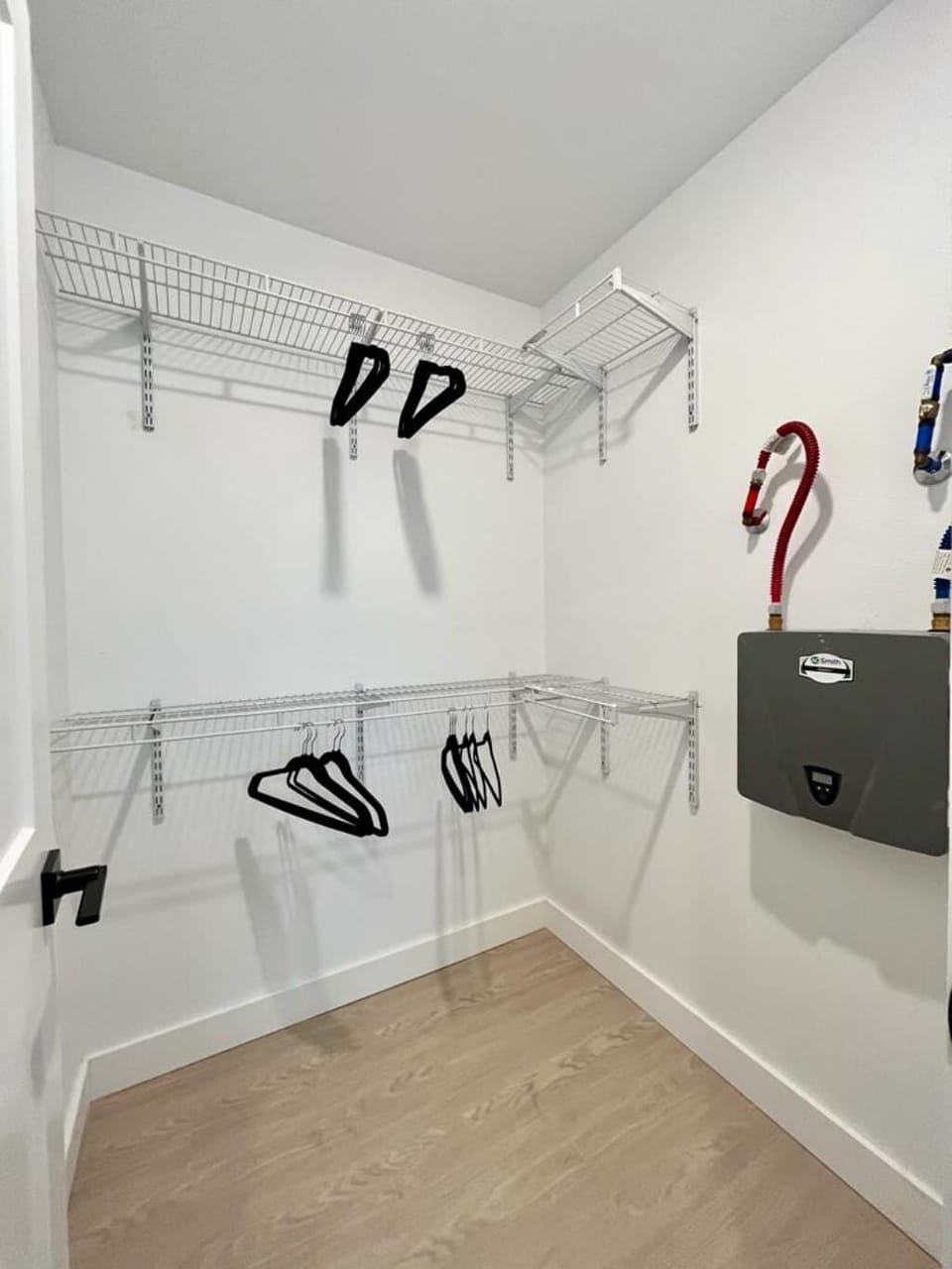 Oversize walk in closet for downstairs bedroom. Perfect for long term stays