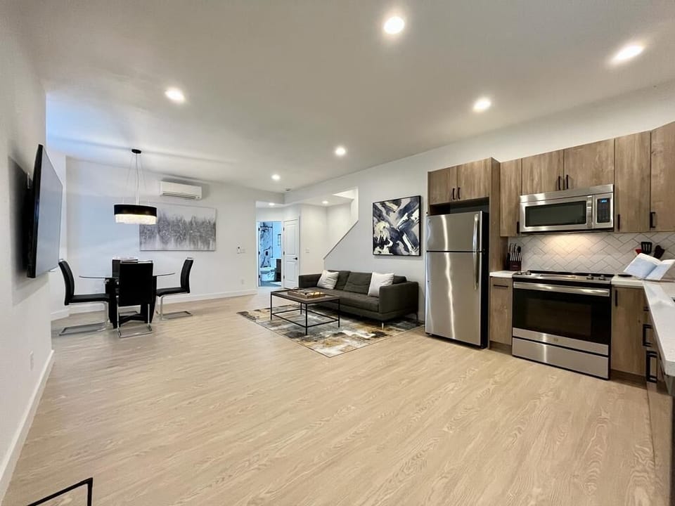 Perfect blend of living, dining, and cooking in our open-concept space.