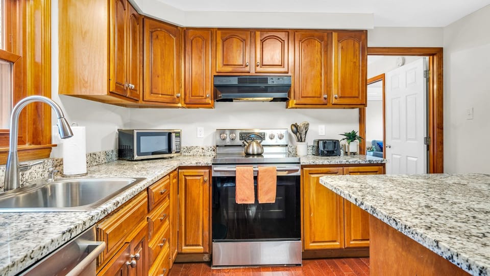 Our spacious kitchen is fully equipped with all cooking and dining essentials.