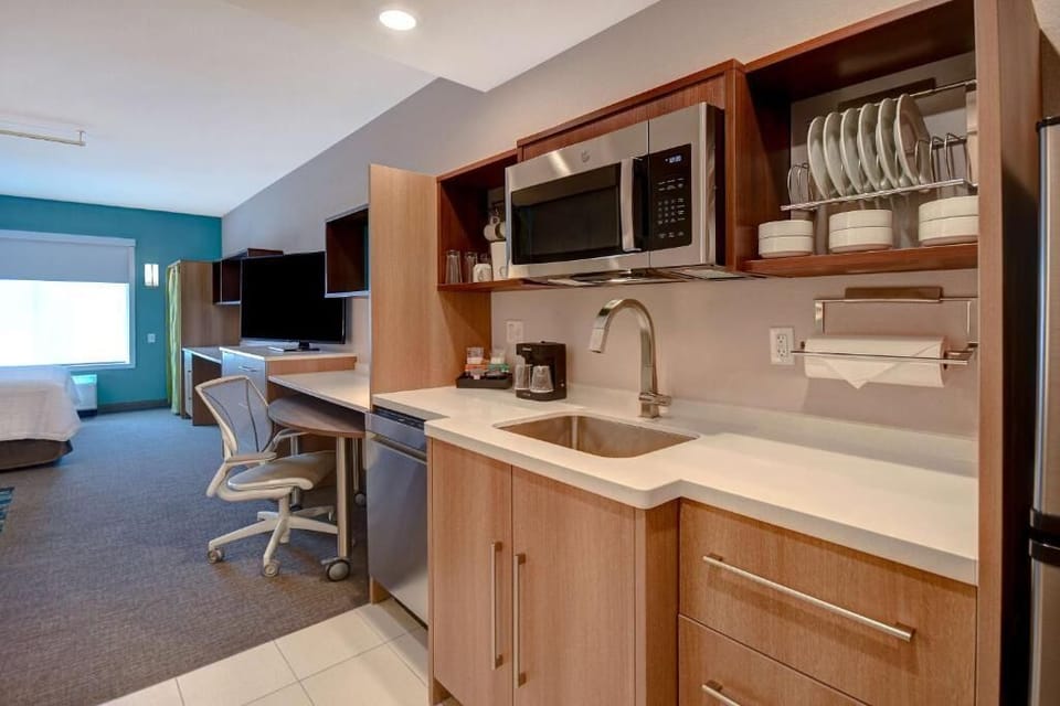 Kick back and enjoy roomy comfort with seating and TV.