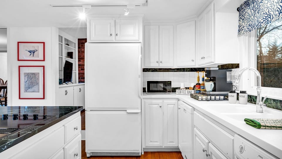 Our spacious kitchen is fully equipped with all cooking and dining essentials.