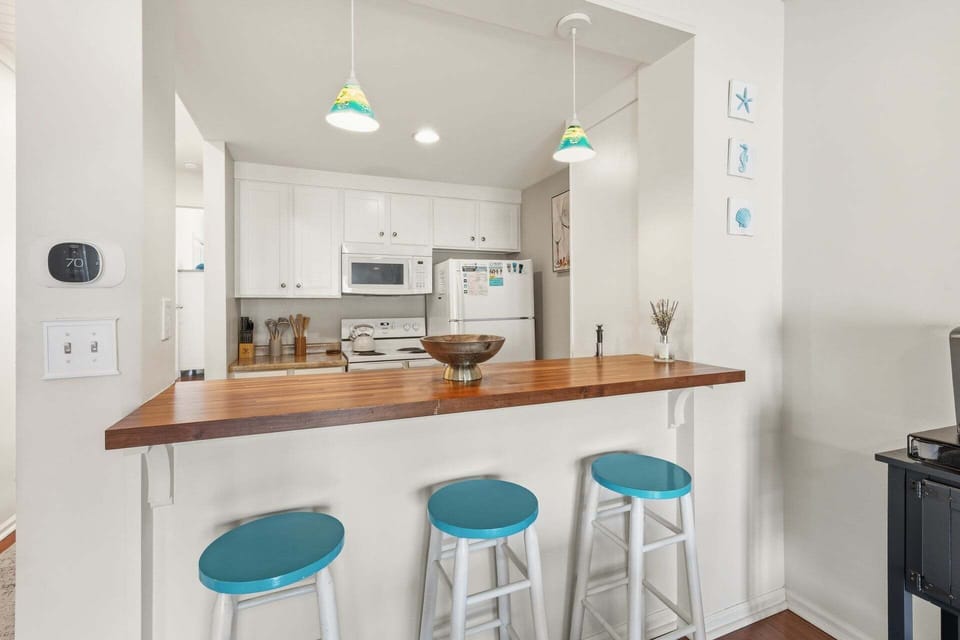 Quaint Kitchen with a Breakfast Bar is perfect for all your OBX culinary needs!