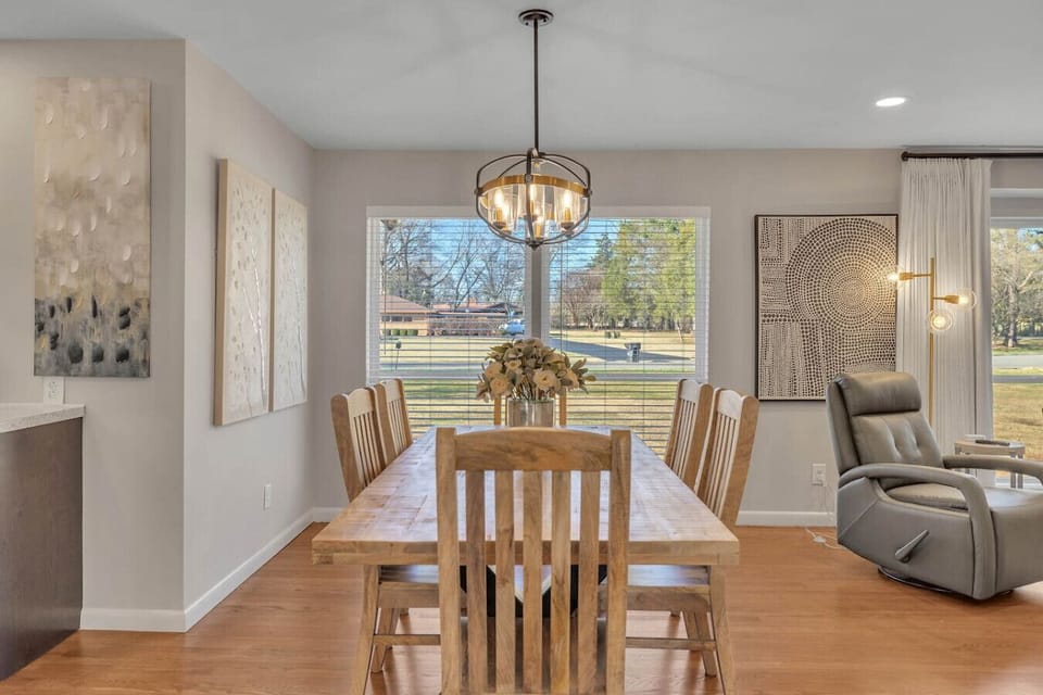 Six person dining table with additional stools at the eat in kitchen