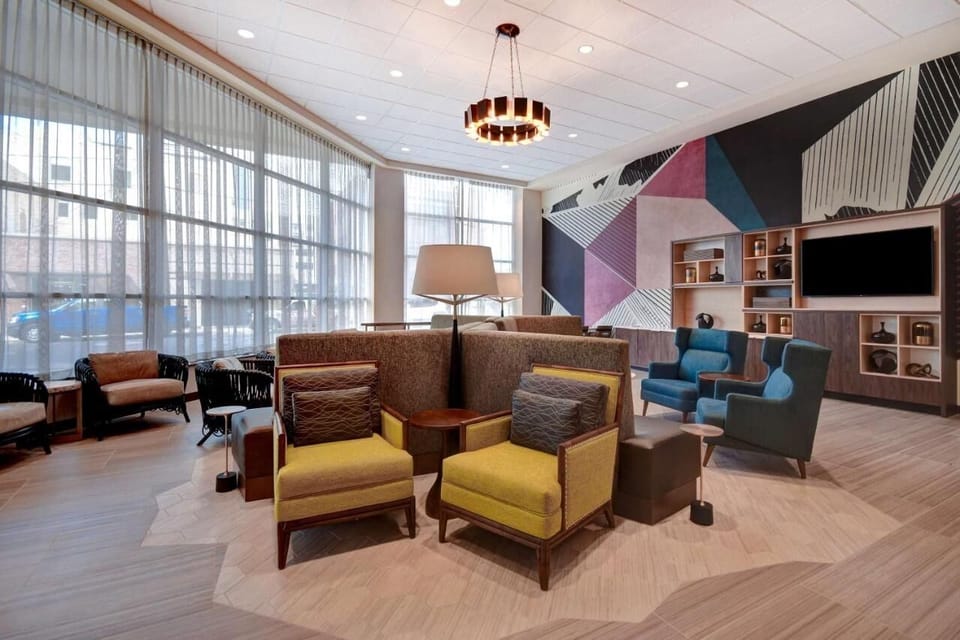 Settle into the vibrant lounge for relaxed conversation and coffee.