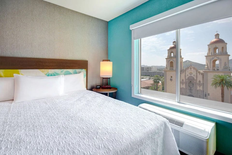 Wake up to iconic views beside crisp, cloudlike bedding.