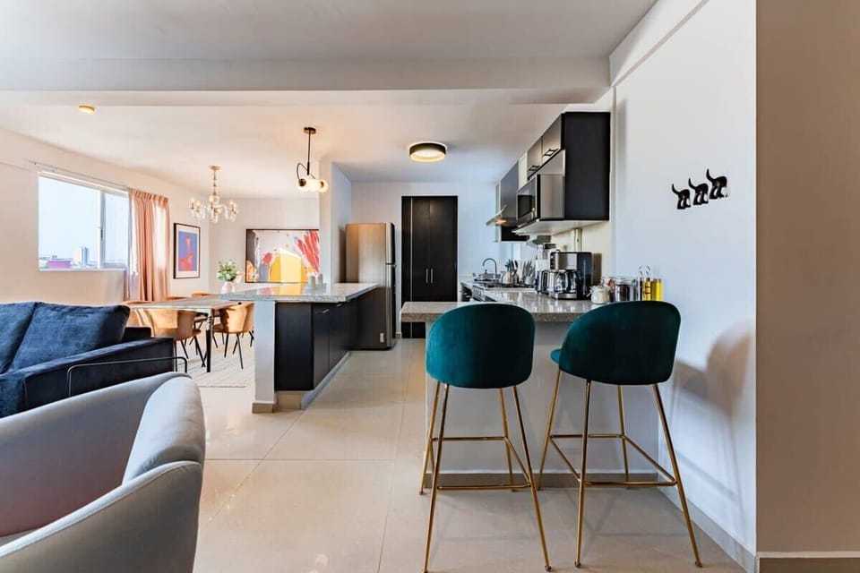 Two stools at the breakfast bar for casual dining.