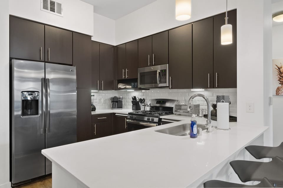 Sleek appliances and ample counter space make meal prep a breeze.