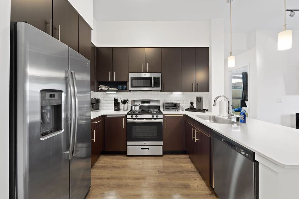Explore culinary delights in our kitchen, fully stocked with everything you need
