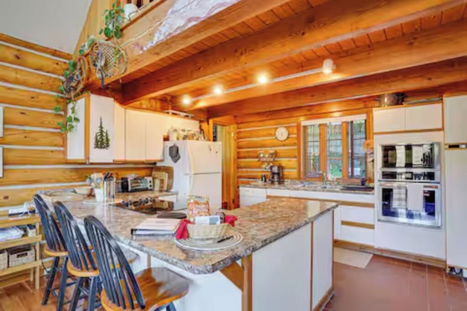 Fully equipped log side kitchen for cooking, baking, & shared meals. (kitchen 1)