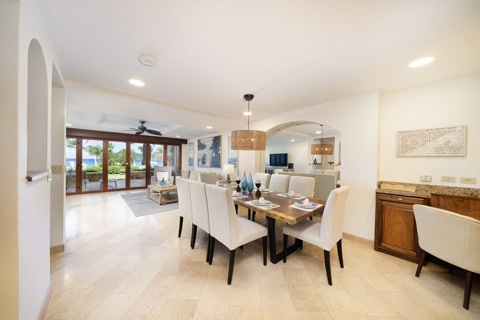 Elegant dining room featuring 8 comfortable seats, perfect for hosting family gatherings