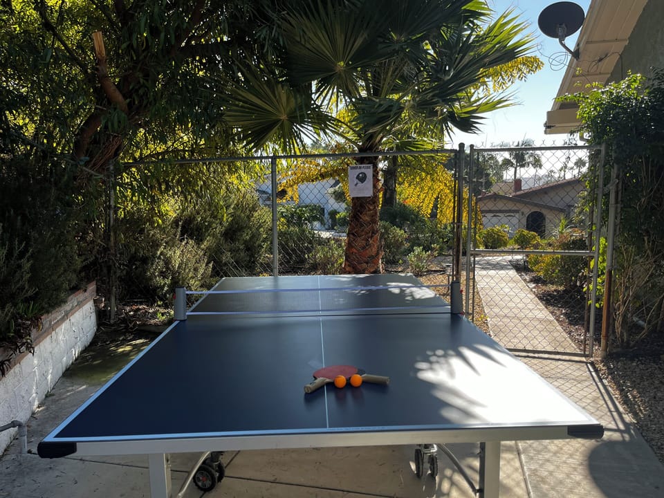 Play ping pong amid lush exotic greenery!