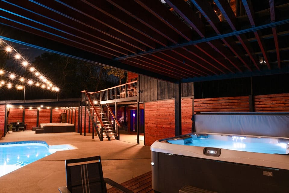 The pergola with the large 8 person hot tub that is wonderful to relax in. It oversees the pool so you can still watch the kids while they swim and it has an amzing sky view that you can enjoy while sipping your favorite glass of wine