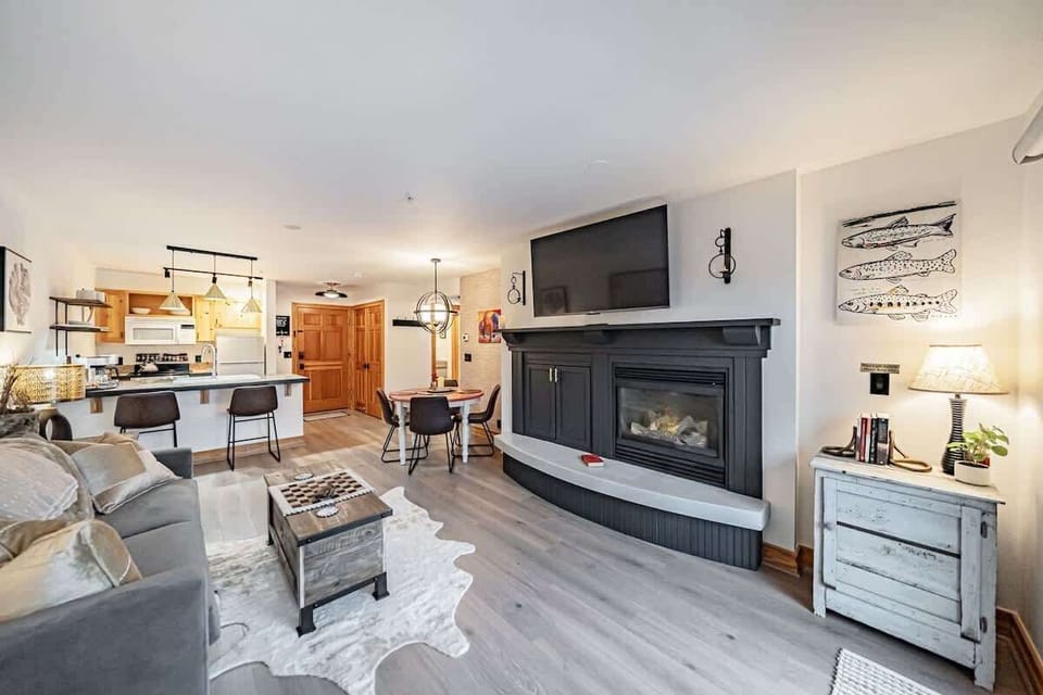 The sheepskin rug and fireplace keeps keep the living room cozy in the winter. 
