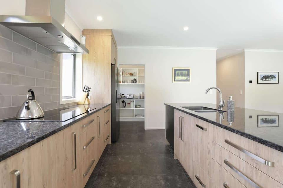 Kitchen with stone island bench