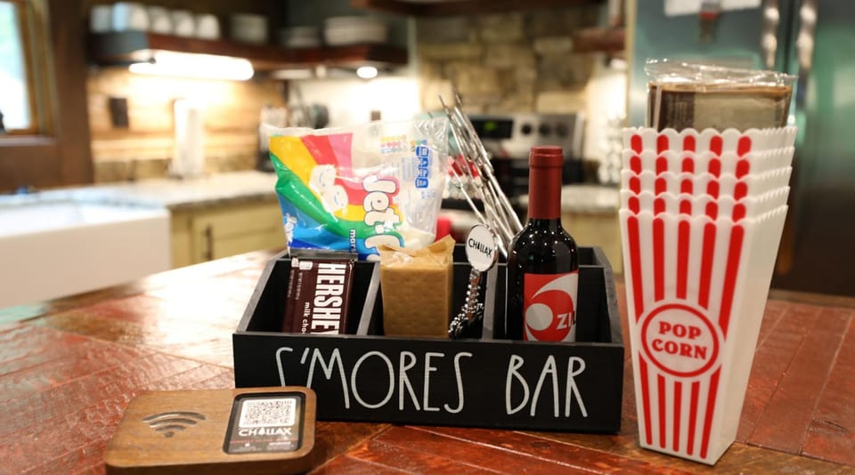 Let's Netflix & chillax indoors with s'mores, popcorn, & wine!