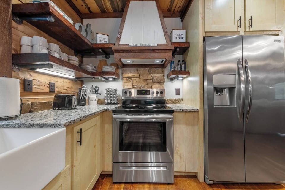 The kitchen has a fully stocked coffee/s'mores bar, cookware, crockpot, etc.